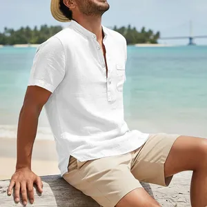 Macro view of white linen men's shirt featuring vintage Henley collar and pocket detail