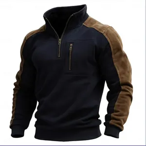 Detail view of men's quarter-zip sweatshirt with suede contrast panels and chest pocket