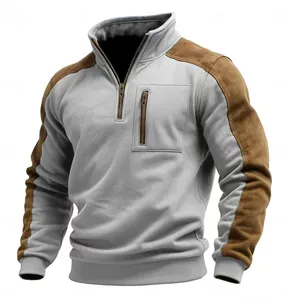 Men's grey quarter-zip sweatshirt featuring brown suede shoulder and sleeve panels