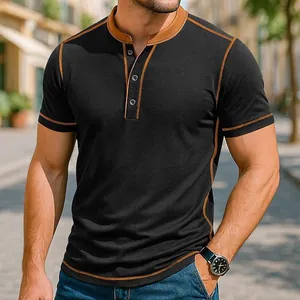 Detail view of men's black Henley t-shirt with brown contrast stitching and collar