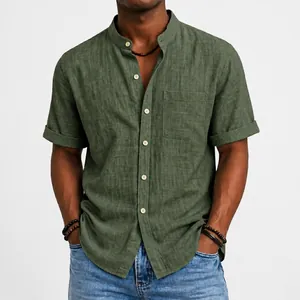 Close-up of olive green men's linen short sleeve shirt with standing collar and pocket