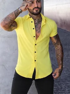 Men's solid yellow short-sleeved casual shirt with contrast black buttons for summer.
