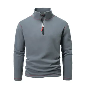 Men's grey quarter-zip polar fleece pullover with tactical style and red stitching details