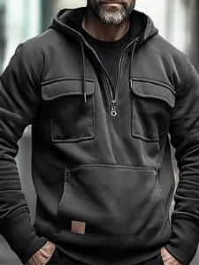Hochwertiger Herren-Kapuzenpullover in Anthrazit mit halbem Reißverschluss und Taschen.