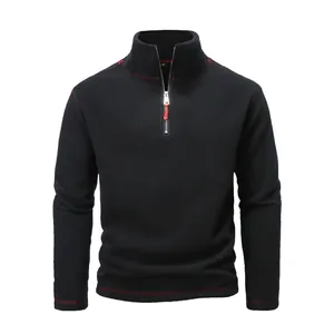 Close-up of black tactical polar fleece pullover with red contrast stitching