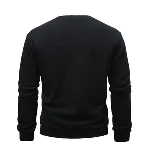 Back view of a classic black crewneck sweatshirt with ribbed cuffs and hem