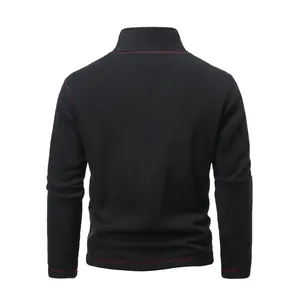 Back view of black tactical fleece pullover for men with red stitching and stand collar