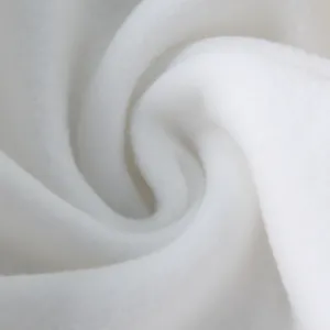 Macro view of high-quality soft white polar fleece fabric texture showing thick fuzzy pile