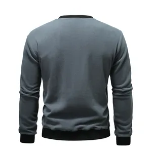 Back view of a men's grey fleece sweatshirt with black ribbed cuffs and collar