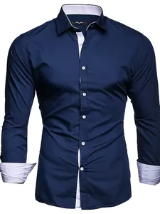 Detail of professional men's navy blue shirt with white contrast collar and cuffs