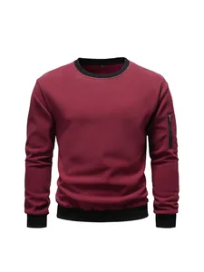 Casual men's burgundy crew neck sweatshirt with zipper arm pocket and black ribbed trim
