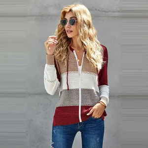 Detail of a striped hooded knit cardigan sweater with zipper and hollowed-out sleeves