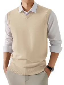 Detailed shot of a beige V-neck knit sweater vest styled with a crisp white shirt