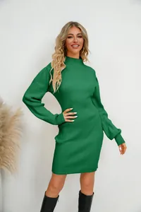 Detail shot of women's elegant green ribbed knit long-sleeve dress for autumn fashion