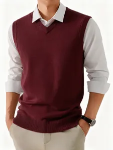 Detailed view of a burgundy V-neck knitted sweater vest for men in a layered style