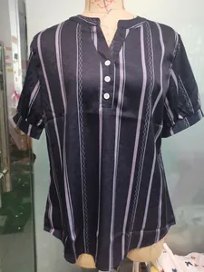Detailed front view of navy striped short-sleeve V-neck blouse on a mannequin