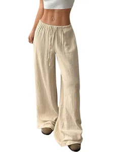 Vue détaillée d'un pantalon large décontracté en coton et lin beige avec cordon