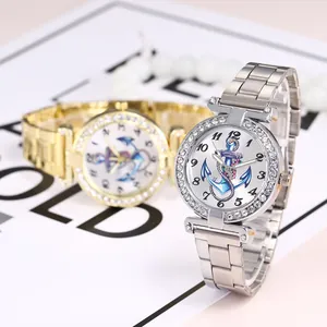 Close-up of elegant women's quartz watches with rhinestone bezel and nautical anchor dial