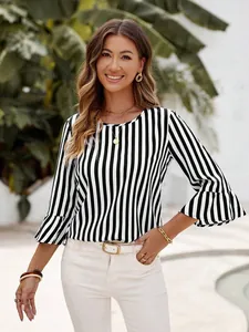 Close-up of black and white striped top with ruffle bell sleeves and round neck