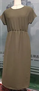 Detail of dark olive short sleeve midi dress with elastic waist and crinkled ice silk texture