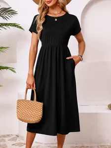 Elegant black short sleeve maxi dress featuring an elastic waist and convenient side pockets