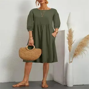 Loose olive green cotton linen dress with lantern sleeves and convenient side pockets