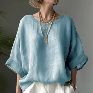 Light blue loose fit linen-style shirt with round neck and drop shoulders for women