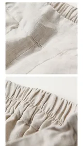 Macro view of the beige cotton linen fabric texture and elastic waistband