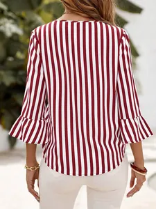 Back view of a red and white striped blouse with stylish ruffled three-quarter sleeves.