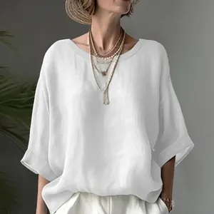 Casual white short sleeve blouse with loose drop shoulder fit and round neck for women