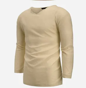 Detailed view of a beige V-neck long-sleeve shirt made from textured cotton linen fabric