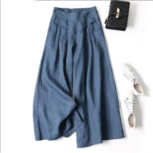 Loose high-waist cotton linen wide-leg culottes in blue with a draped silhouette