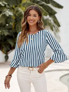 Detail view of blue vertical striped top with elegant bell sleeves and round neck
