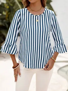 Detail showing the blue and white vertical striped pattern and flared 3/4 bell sleeves.