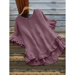 Mauve round neck blouse featuring elegant ruffle flare sleeves and tiered high-low hemline