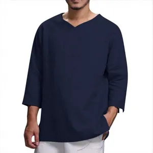 Men's loose navy blue V-neck long sleeve cotton linen shirt on model