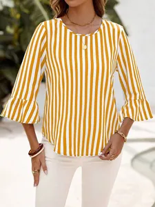 Detailed view of women's yellow and white vertical striped top with bell sleeves