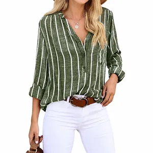 Detailed view of women's casual long-sleeved shirt with green and white vertical stripes