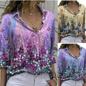 Detail showing various colors of V-neck buttoned batwing floral print blouse