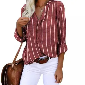 Close-up of women's red and white vertical striped blouse with button-up V-neck detail