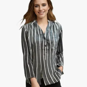 Detailed view of women's casual grey vertical striped long sleeve shirt with buttons