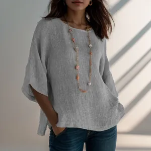 Vintage grijze katoenen linnen blouse met driekwart mouwen en een ronde halslijn