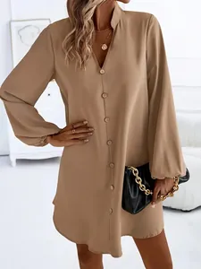 Detailed view of a stylish khaki V-neck long sleeve button-up A-line mini dress for women.