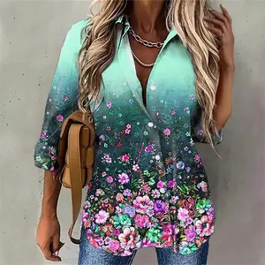 Close-up of women's floral print shirt with gradient green tones and lapel collar