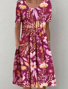 Detailed view of women's floral print dress with round neck and handy side pockets