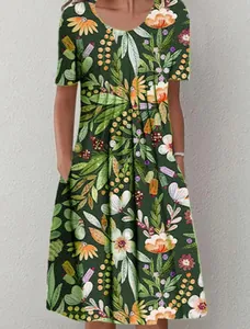 Detail view of women's green floral print short sleeve dress with side pockets.