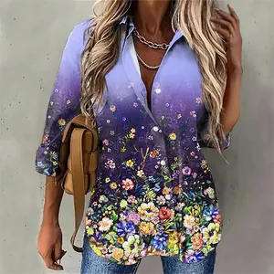 Detailed view of vibrant floral print and gradient purple fabric on a long sleeve shirt.