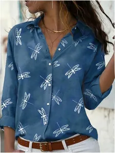 Close-up detail of women's casual loose long sleeve shirt with a dragonfly print