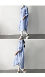 Side and front view of a women's blue and white vertical striped long sleeve shirt tunic