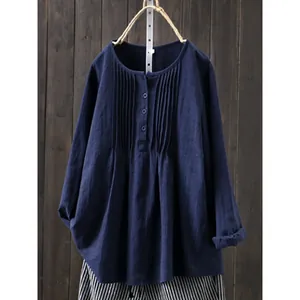 Loose navy blue cotton linen long sleeve shirt featuring pleated chest and round neck